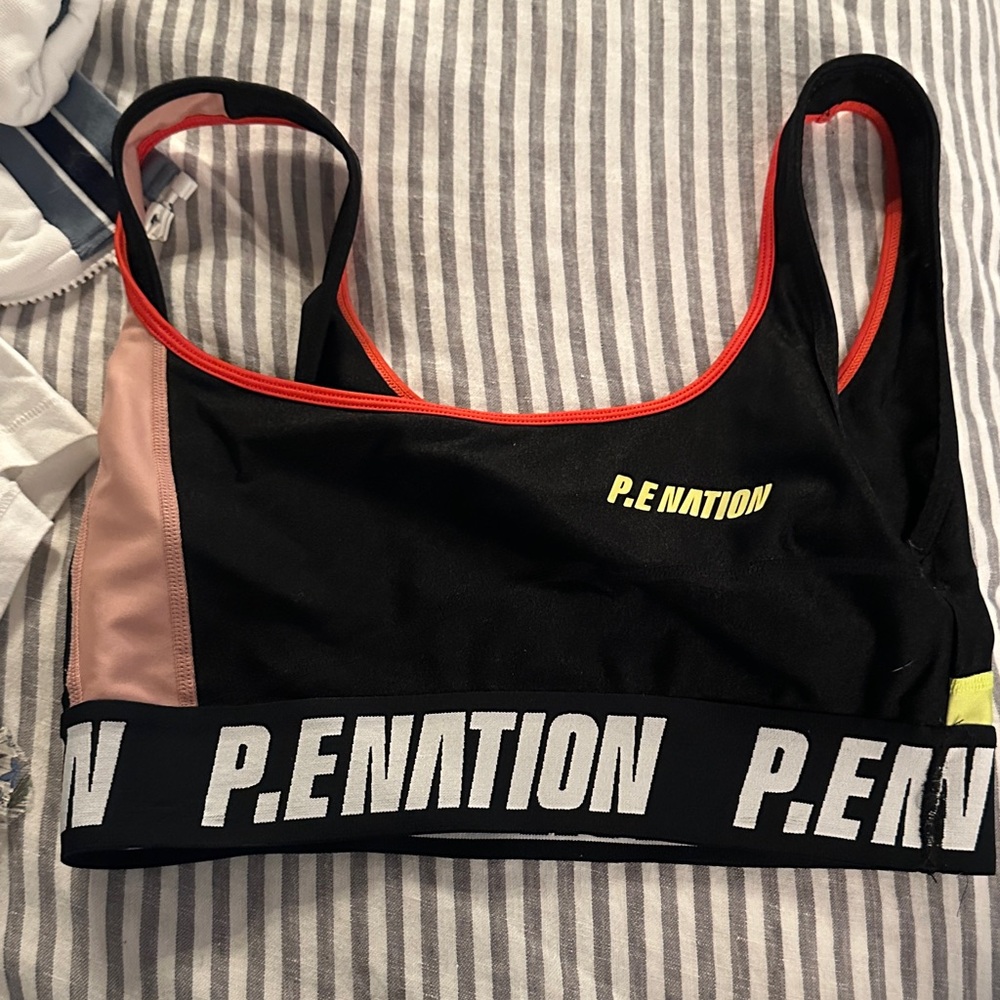 P.E Nation Black Sports Bra with Pink and Yellow Accents